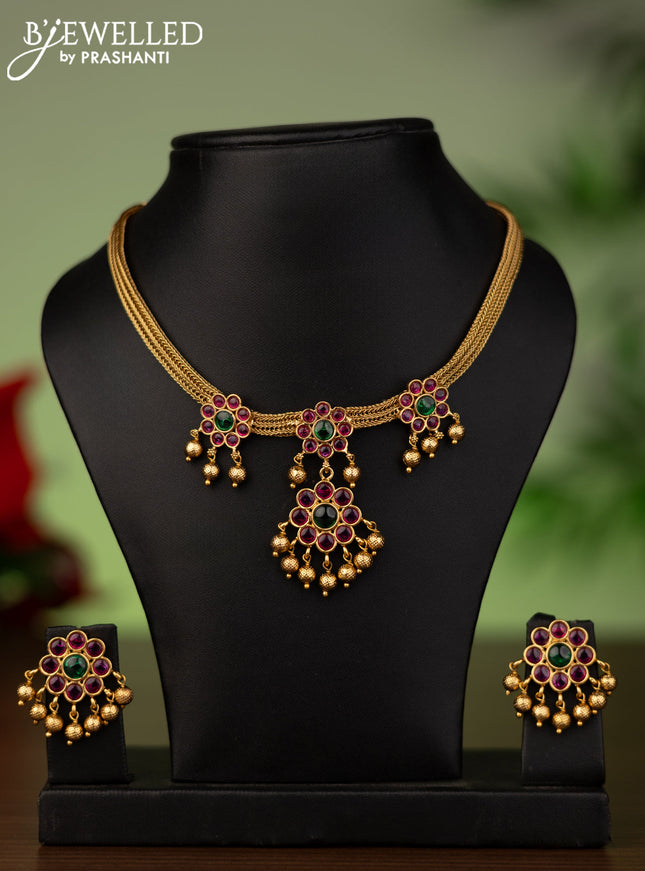 Antique attigai necklace with kemp stones and golden beads hanging