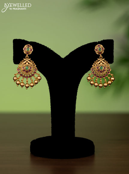 Antique attigai necklace with kemp stones and golden beads hanging