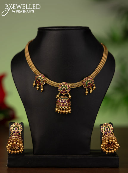 Antique attigai necklace with kemp stones and golden beads hanging