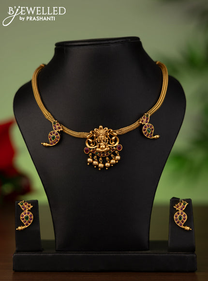 Antique attigai necklace ganesha pendant with kemp stones and golden beads hanging