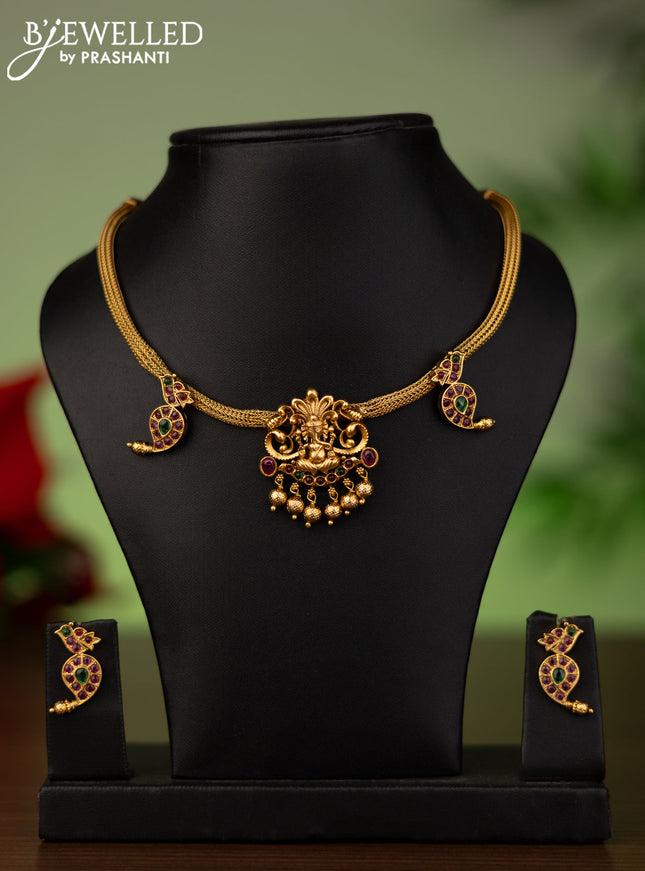 Antique attigai necklace ganesha pendant with kemp stones and golden beads hanging