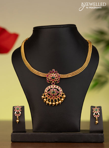 Antique attigai necklace with kemp stones and golden beads hanging