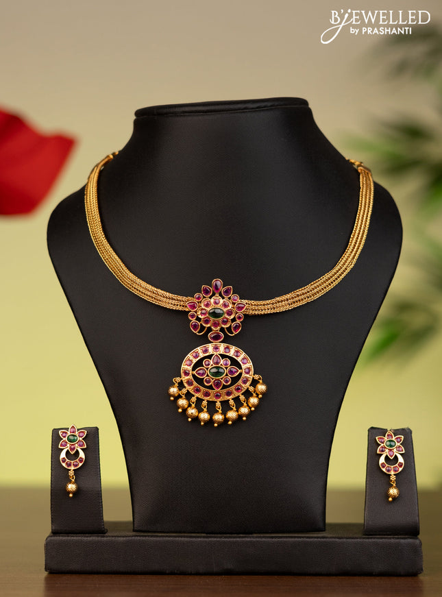 Antique attigai necklace with kemp stones and golden beads hanging