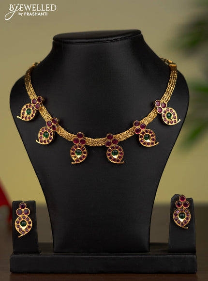 Antique attigai necklace with manga pattern and kemp stones