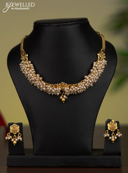 Antique attigai necklace with lakshmi pendant and pearl hangings