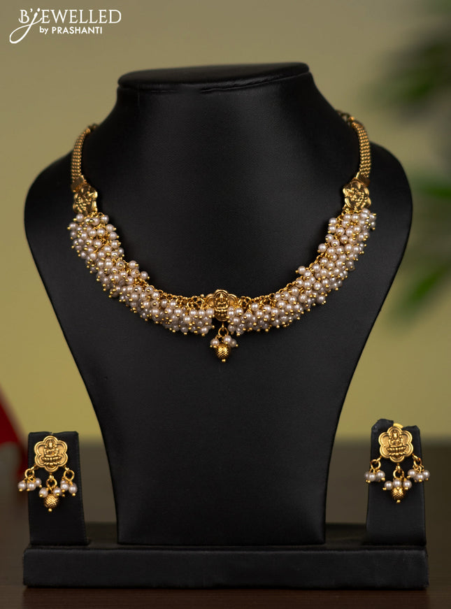 Antique attigai necklace with lakshmi pendant and pearl hangings