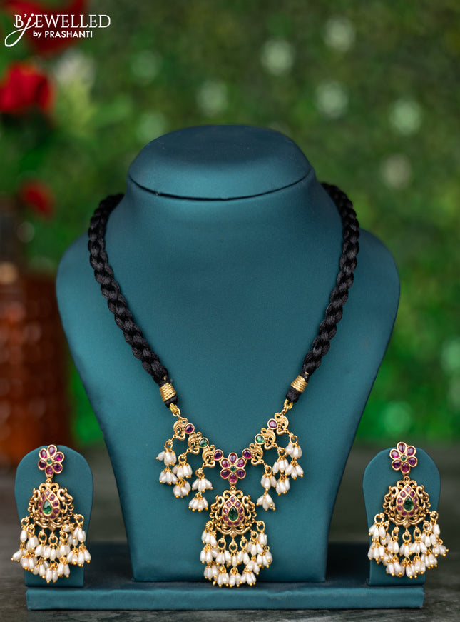 Black thread necklace with kemp stones and pearl hangings