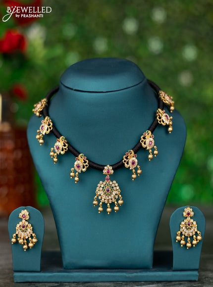 Black thread necklace peacock design with kemp & cz stones and golden beads hanging