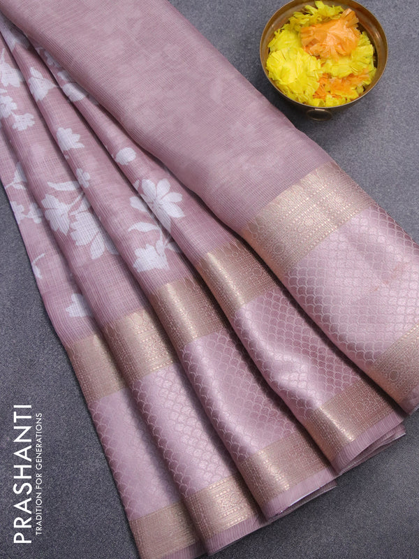 Kota saree pastel pink with allover floral prints and rettapet zari woven border