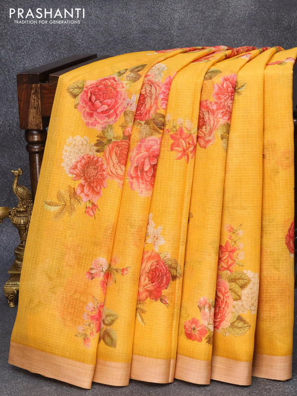Kota silk cotton saree yellow   with allover floral prints and simple border