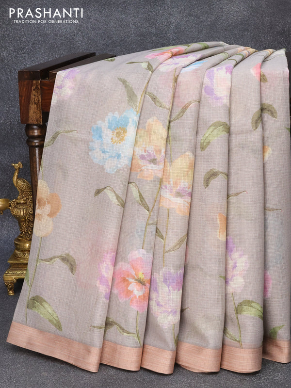 Kota silk cotton saree grey   with allover floral prints and simple border