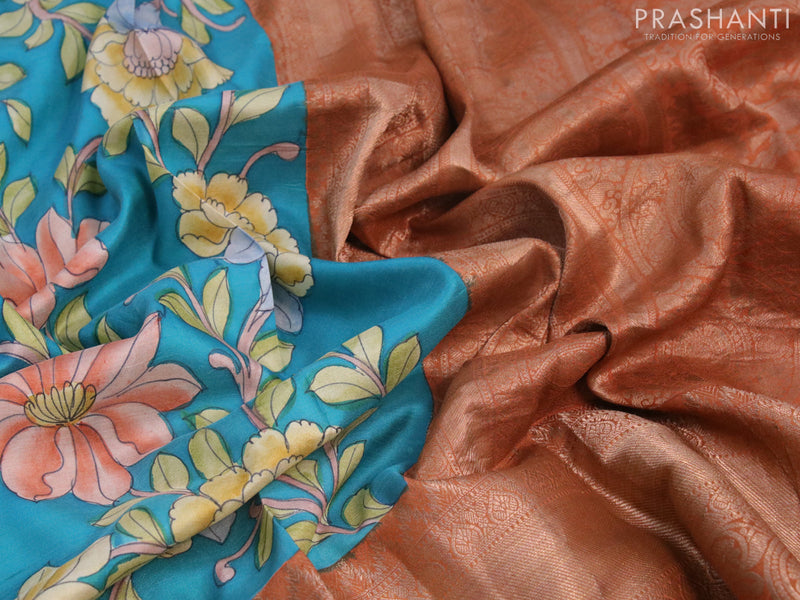 Pure kanjivaram silk saree teal blue and rust shade with allover floral digital prints and long zari woven border