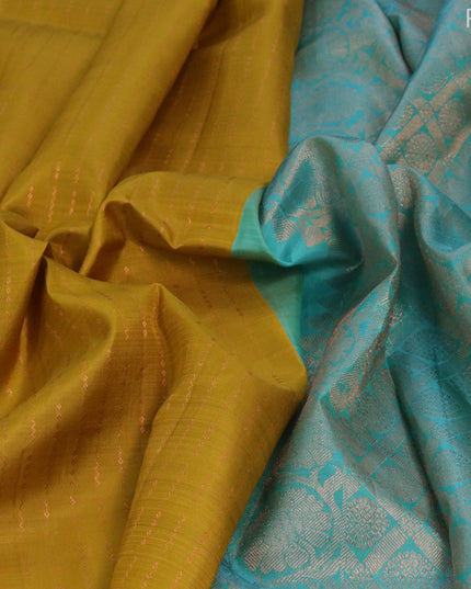 Pure kanjivaram silk saree mustard yellow and teal blue with allover copper zari weaves in borderless style