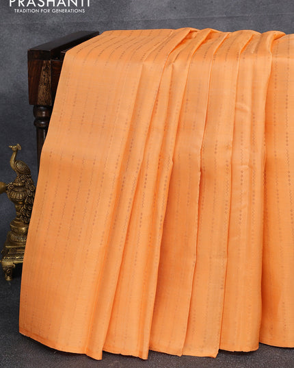 Pure kanjivaram silk saree pale orange with allover copper zari weaves in borderless style