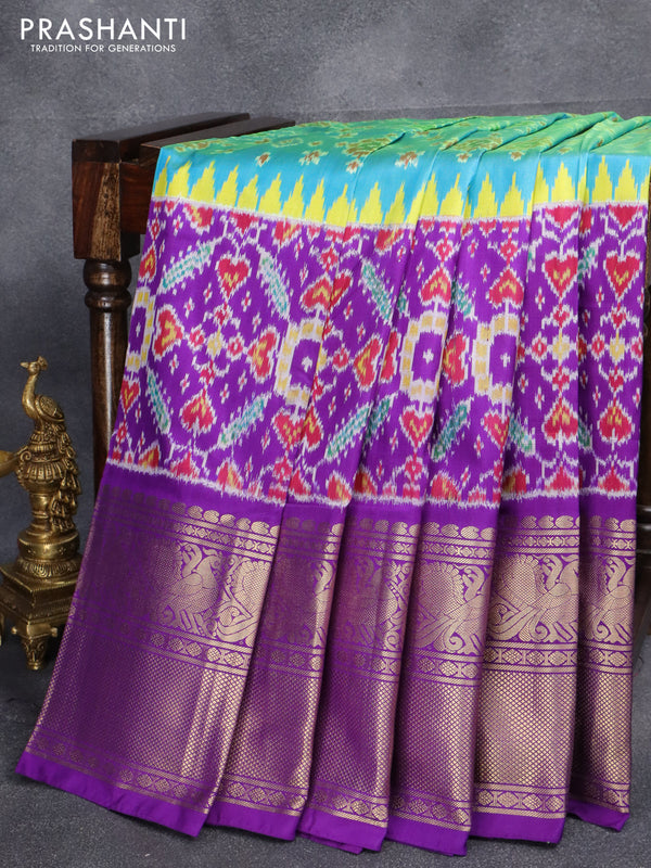 Pochampally silk saree dual shade of teal blue and violet with allover ikat weaves and long annam zari woven border