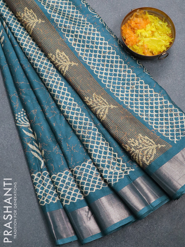 Semi dola saree peacock blue with allover prints and zari woven border