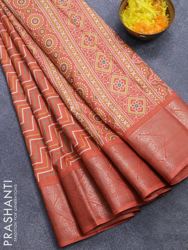 Semi dola saree orange with allover geometric prints and zari woven border