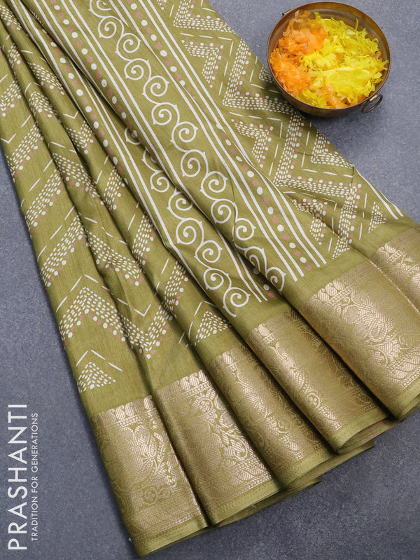 Semi dola saree green shade with allover prints and floral zari woven border