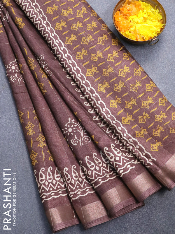 Semi dola saree brown shade with allover zari checks & prints and zari woven border