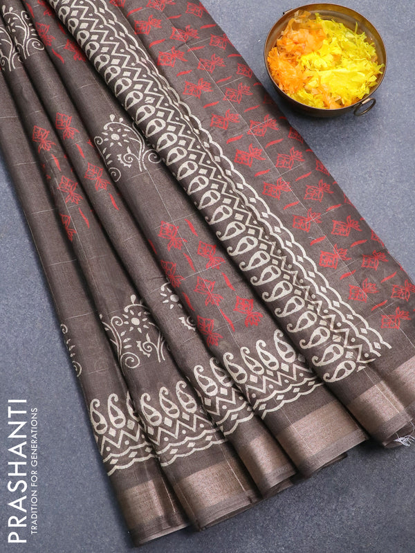 Semi dola saree pastel brown with allover zari checks & prints and zari woven border