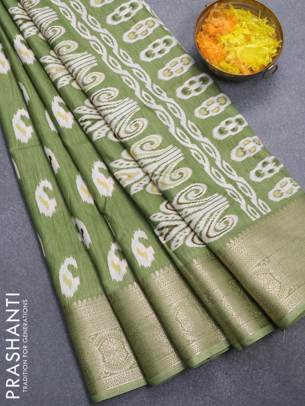 Semi dola saree light green with paisley butta prints and zari woven border