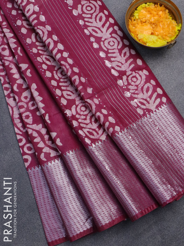 Semi tussar saree wine shade with allover batik prints & sequin work pallu and long silver zari woven border