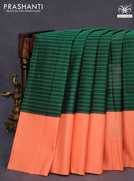 Pure soft silk saree green and peach orange with allover zari woven stripes pattern and zari woven butta border