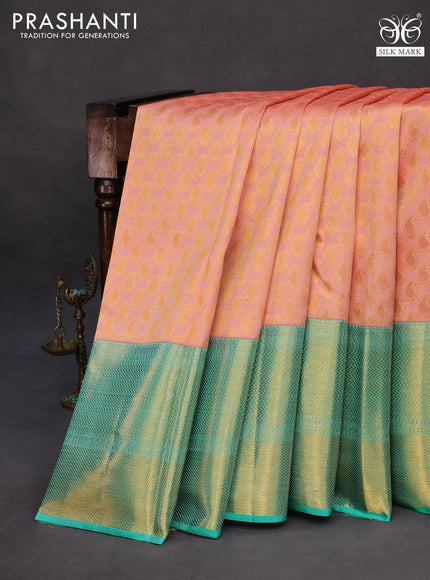 Pure kanchipuram silk saree peach pink and teal blue with allover zari woven paisley butta weaves and long zari woven border