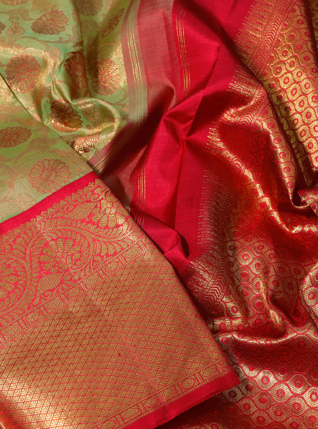 Pure kanchipuram tissue silk saree lime green and red with allover zari woven brocade weaves and long zari woven border