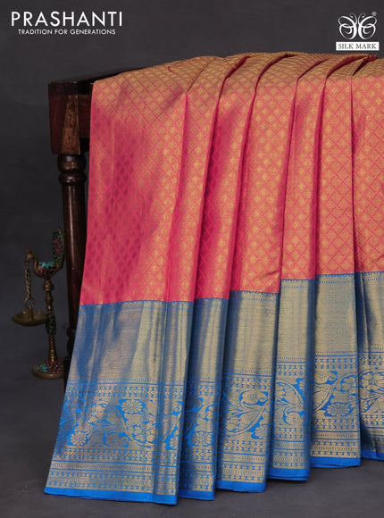 Pure kanchipuram tissue silk saree dual shade of pinkish gold and cs blue with allover zari woven brocade weaves and long zari woven border
