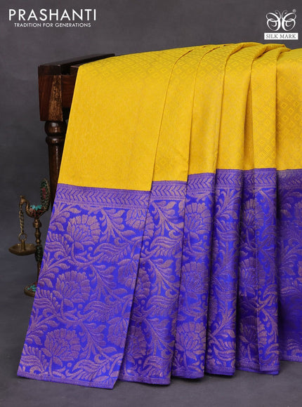 Pure kanchipuram silk saree yellow and royal blue with allover zari woven brocade weaves and long zari woven border