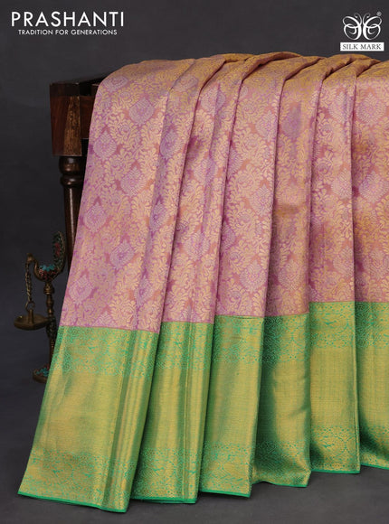 Pure kanchipuram tissue silk saree dual shade of lavender and teal green with allover zari woven brocade weaves and long zari woven border