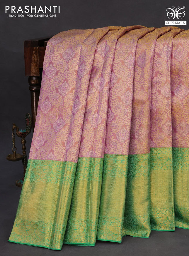 Pure kanchipuram tissue silk saree dual shade of lavender and teal green with allover zari woven brocade weaves and long zari woven border