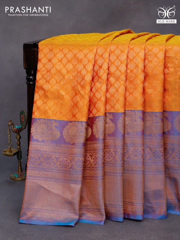 Gadwal silk saree mustard yellow and dual shade of blue with allover zari woven brocade weaves and long zari woven border