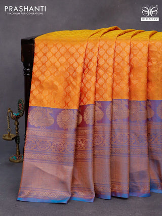 Gadwal silk saree mustard yellow and dual shade of blue with allover zari woven brocade weaves and long zari woven border