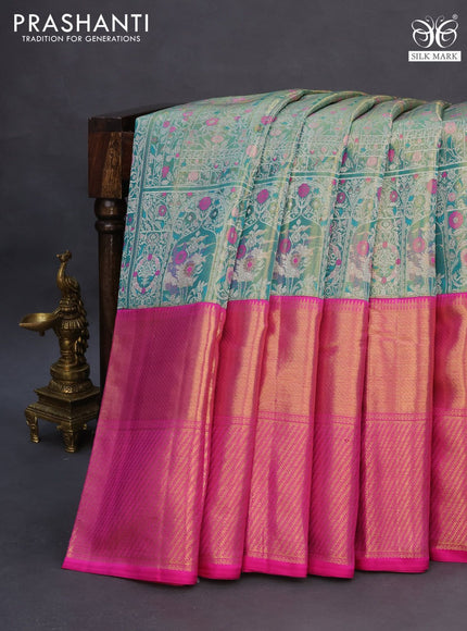 Pure kanchipuram tissue silk saree teal shade shade and pink with allover zari woven brocade weaves and long zari woven border