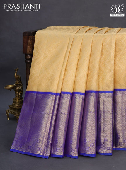 Pure kanchipuram silk saree sandal and blue with allover zari woven brocade weaves and long zari woven border