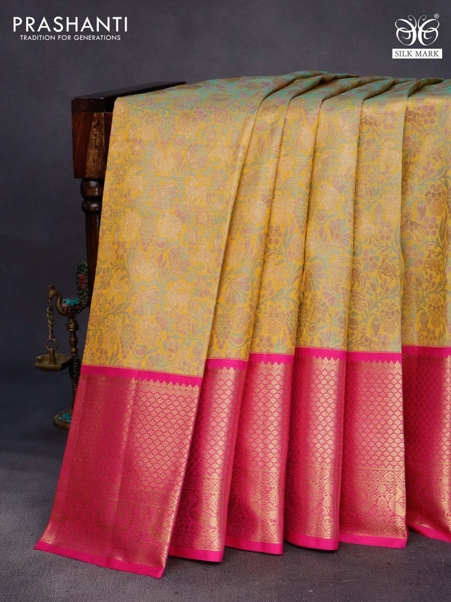 Pure kanchipuram tissue silk saree mustard shade and pink with allover zari woven brocade weaves and long annam zari woven border