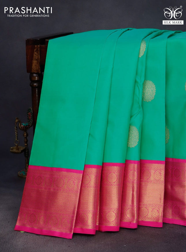 Pure kanchipuram silk saree teal green shade and pink with zari woven buttas and long zari woven korvai border