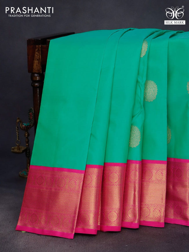 Pure kanchipuram silk saree teal green shade and pink with zari woven buttas and long zari woven korvai border