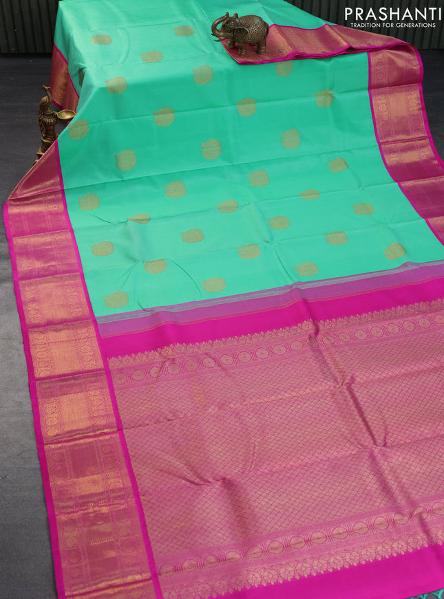 Pure kanchipuram silk saree teal green shade and pink with zari woven buttas and long zari woven korvai border