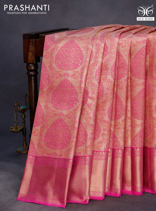 Pure kanchipuram tissue silk saree peach shade and pink with allover zari woven brocade weaves and zari woven border