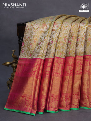 Pure kanchipuram tissue silk saree gold and pink with allover silver zari woven brocade weaves and long annam zari woven border