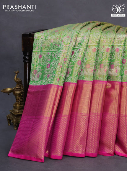 Pure kanchipuram tissue silk saree light green and pink with allover silver zari woven brocade weaves and long zari woven border