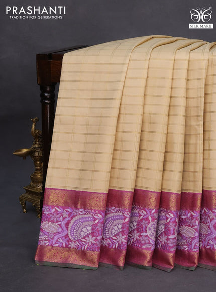Pure kanchipuram silk saree cream and lavender shade with allover zari checked pattern and embroidery work zari border