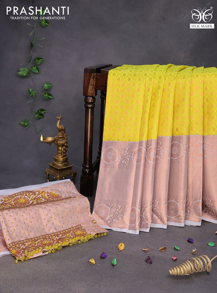 Pure kanchipuram silk saree lime yellow and pastel grey with allover zari woven brocade weaves and long copper zari woven border & embroidery work blouse