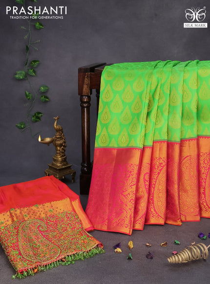 Pure kanchipuram silk saree light green and dual shade of pinkish orange with allover zari woven buttas and long zari woven border & embroidery work blouse