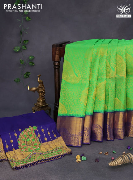 Pure kanchipuram silk saree light green and dark blue with allover zari woven brocade weaves and zari woven border & embroidery work blouse
