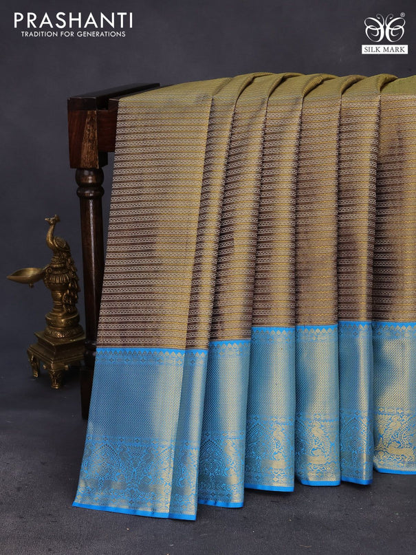 Pure kanchipuram tissue silk saree dual shade of blackish gold and cs blue with allover zari weaves and zari woven border