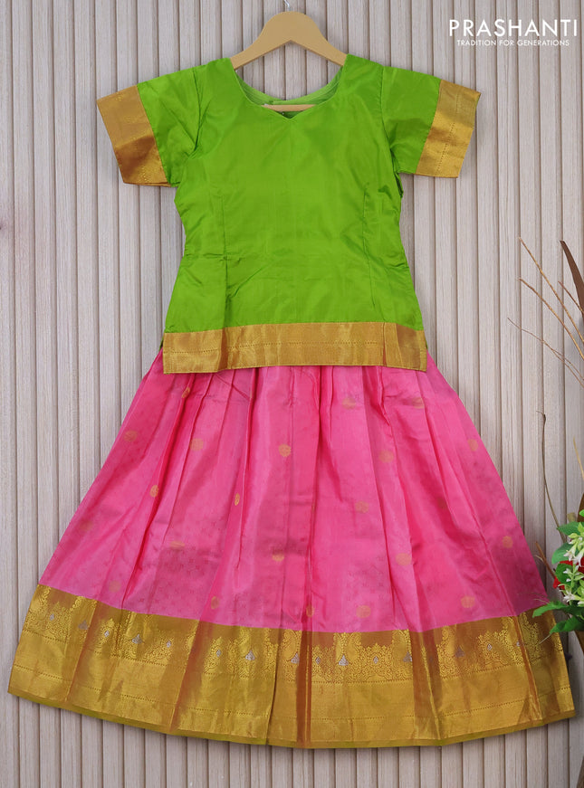 Silk kids lehenga fluorescent green and pink with plain body and self emboss & zari border for 7 years